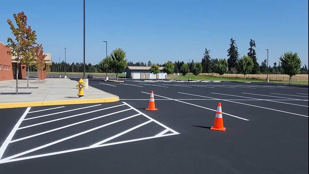 SEALCOAT AND STRIPING 