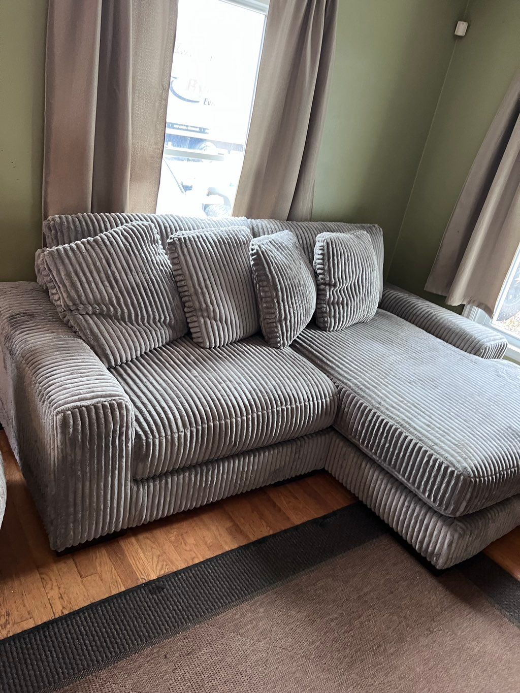 Customer taking Delivery of Couch. Very nice! From