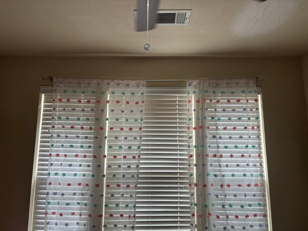Hung curtains in the room as well