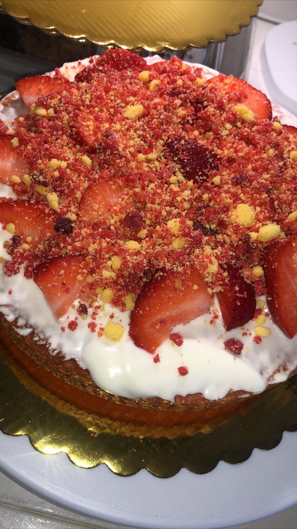 Strawberry cake with fresh whipped cream topped wi