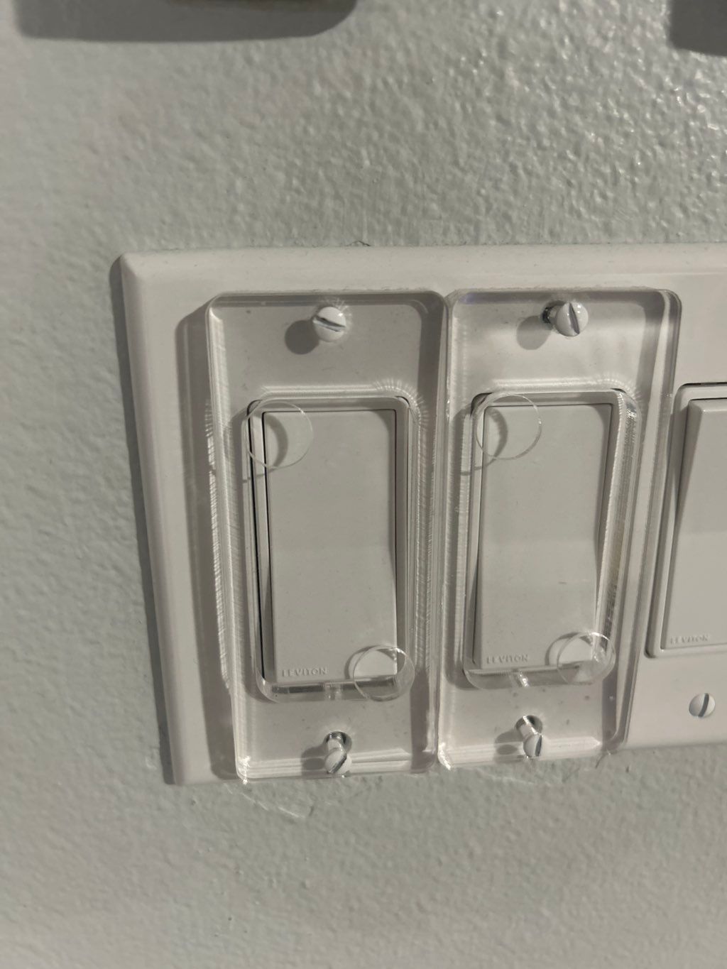 Light switch guard used in ceiling fan remote inst