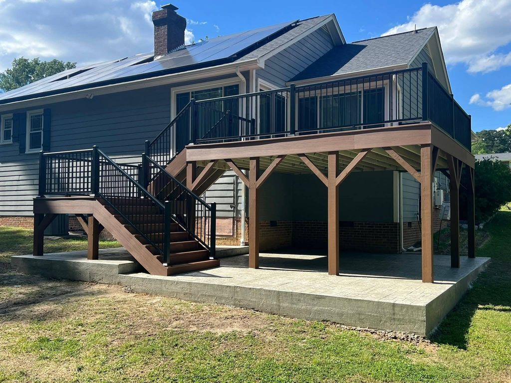 beautiful composite deck. Done Spring 2025
