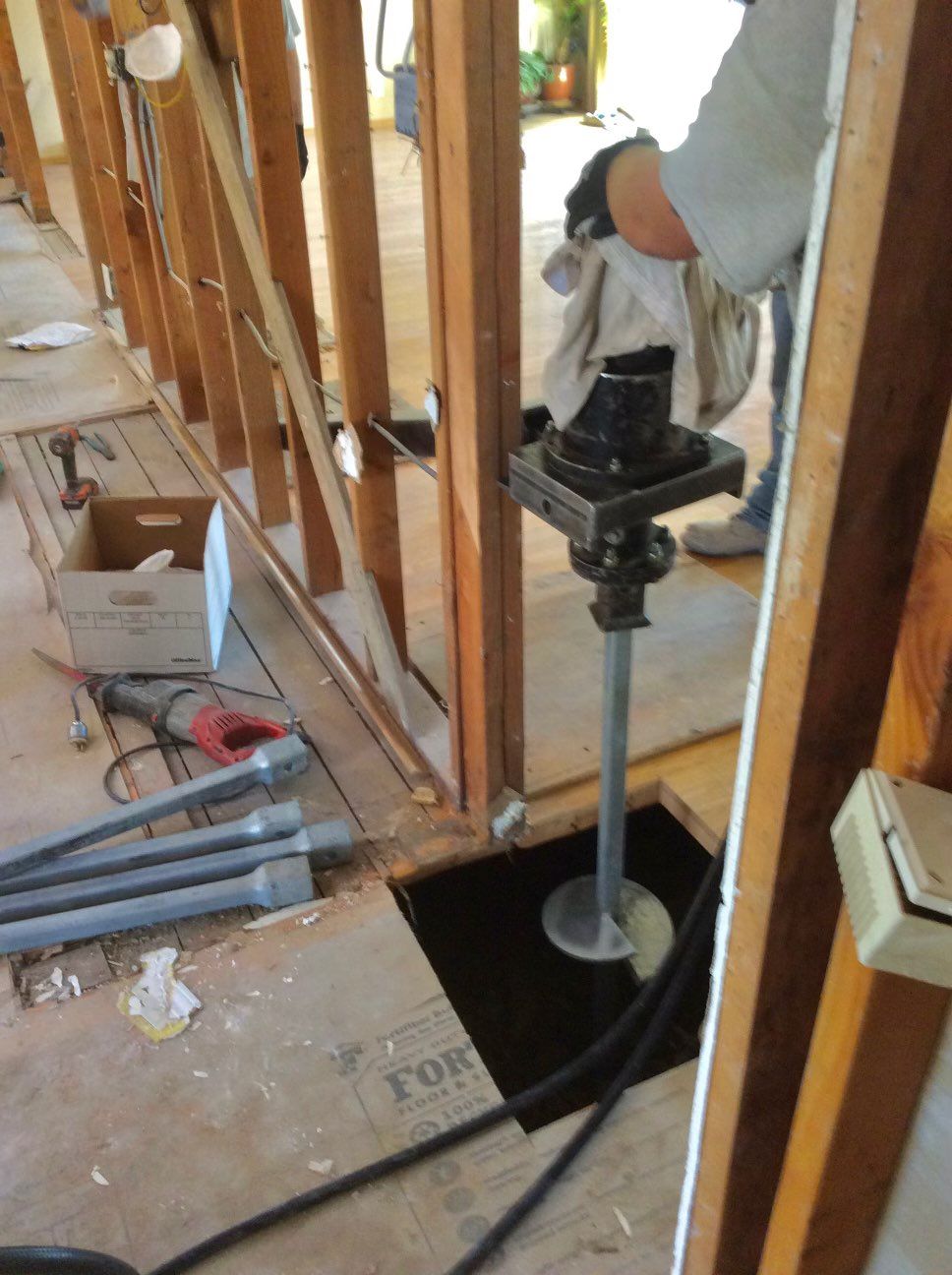 Helical Torque Anchor Being Drilled Vertically at 