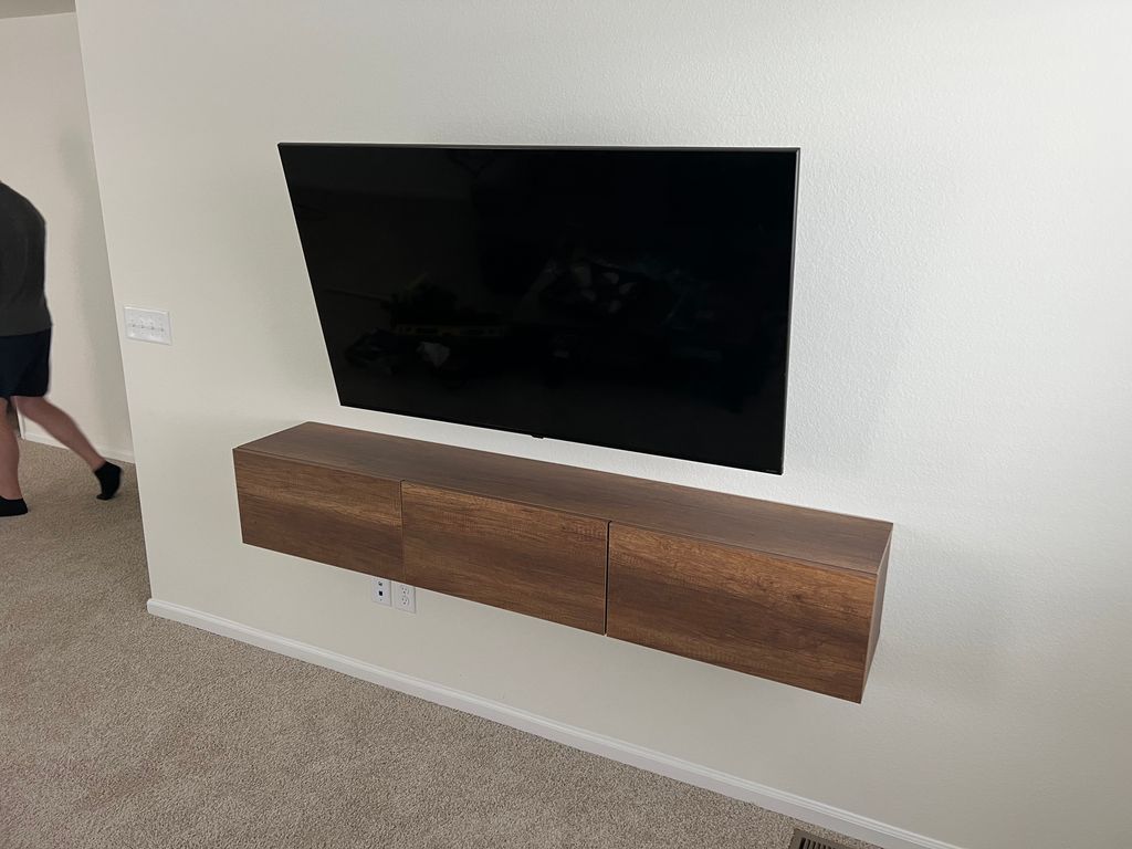 Install floating shelf and TV