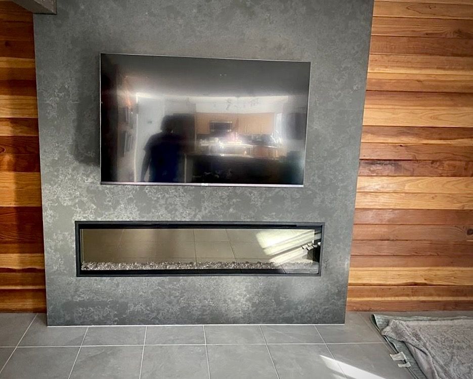 solid slab panel install with tv mounted and firep