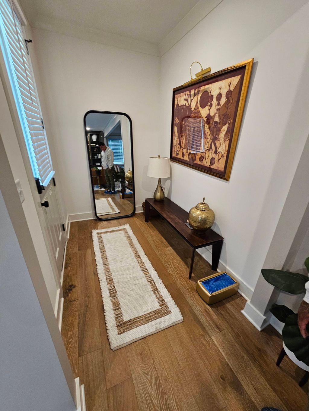 Before painting and installation of mouldings. 