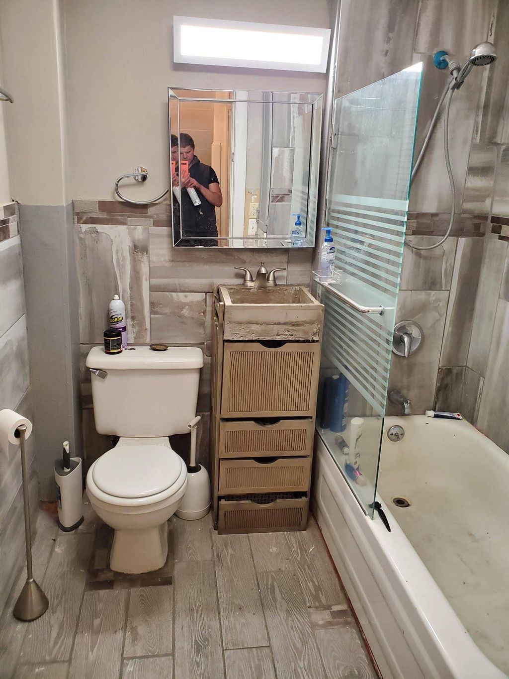 Bathroom after w/ handmade cement sink and vanity