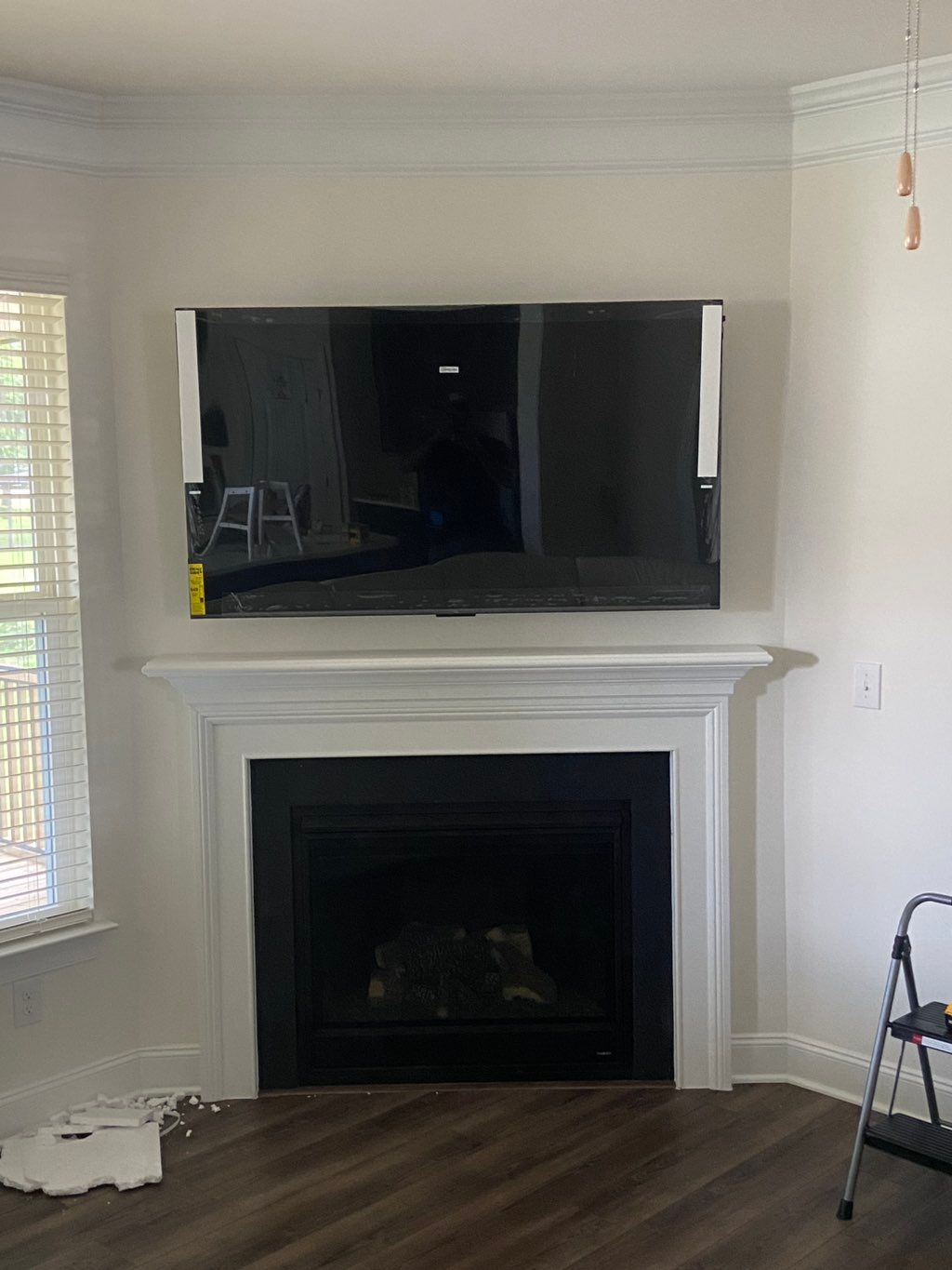 65in over the fireplace w/wire concealment 