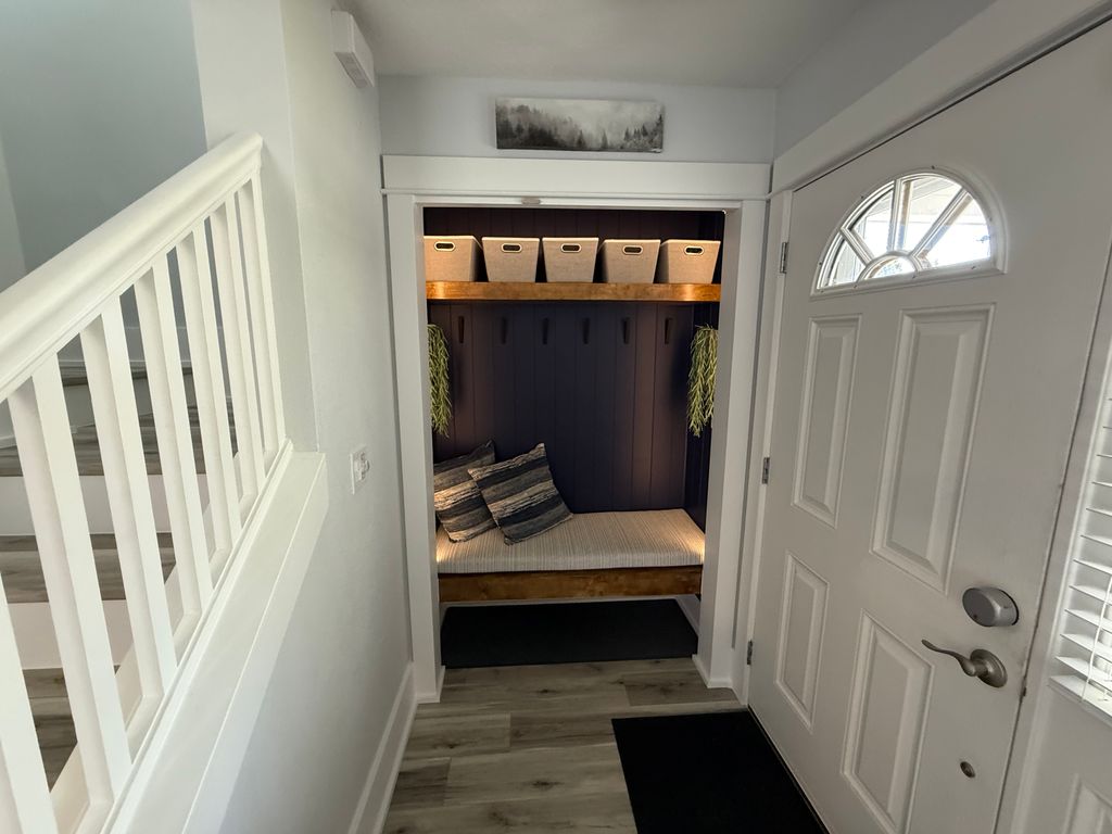 Entryway closet converted to mud room 