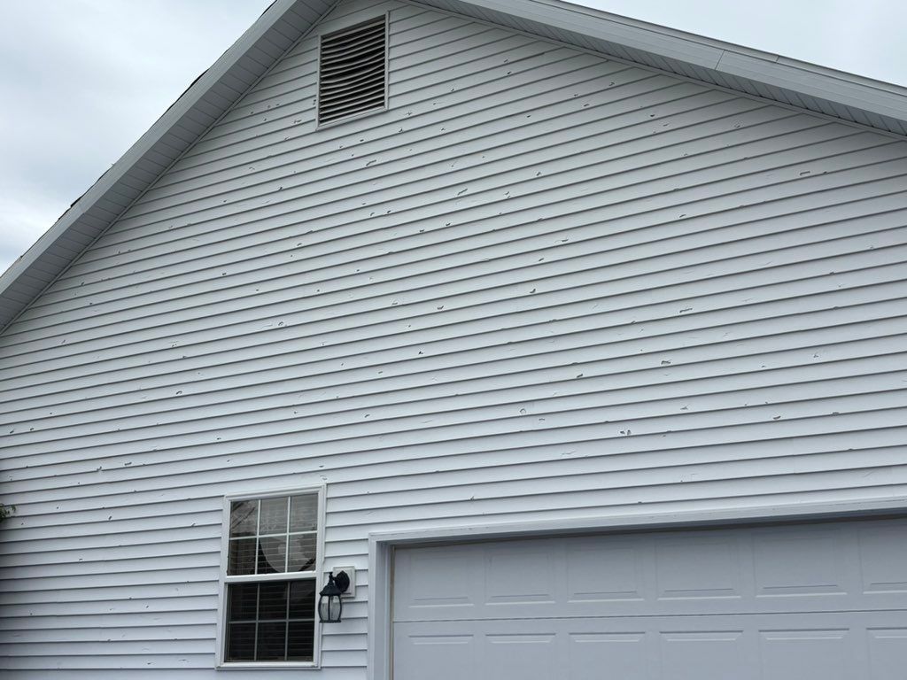 Before siding replacement from hail damage 