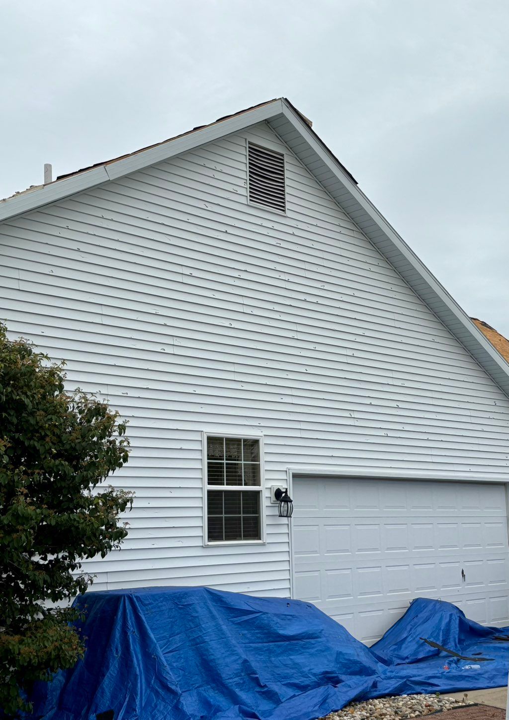 Before siding replacement from hail damage 