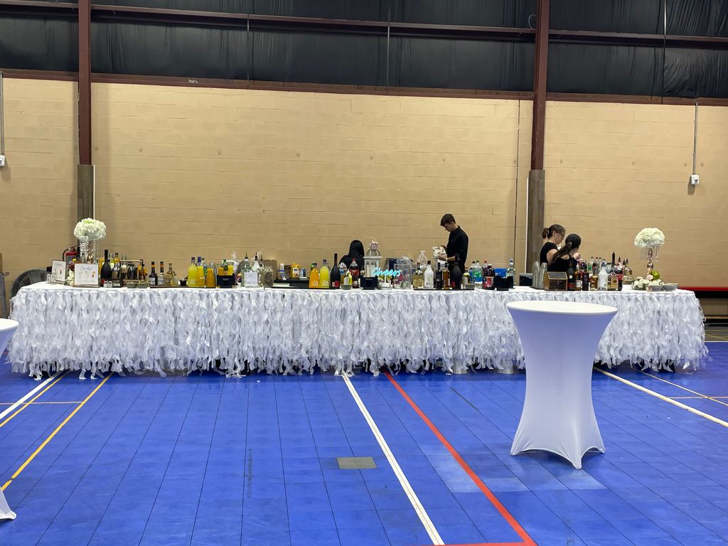 Setting up the bar for the wedding