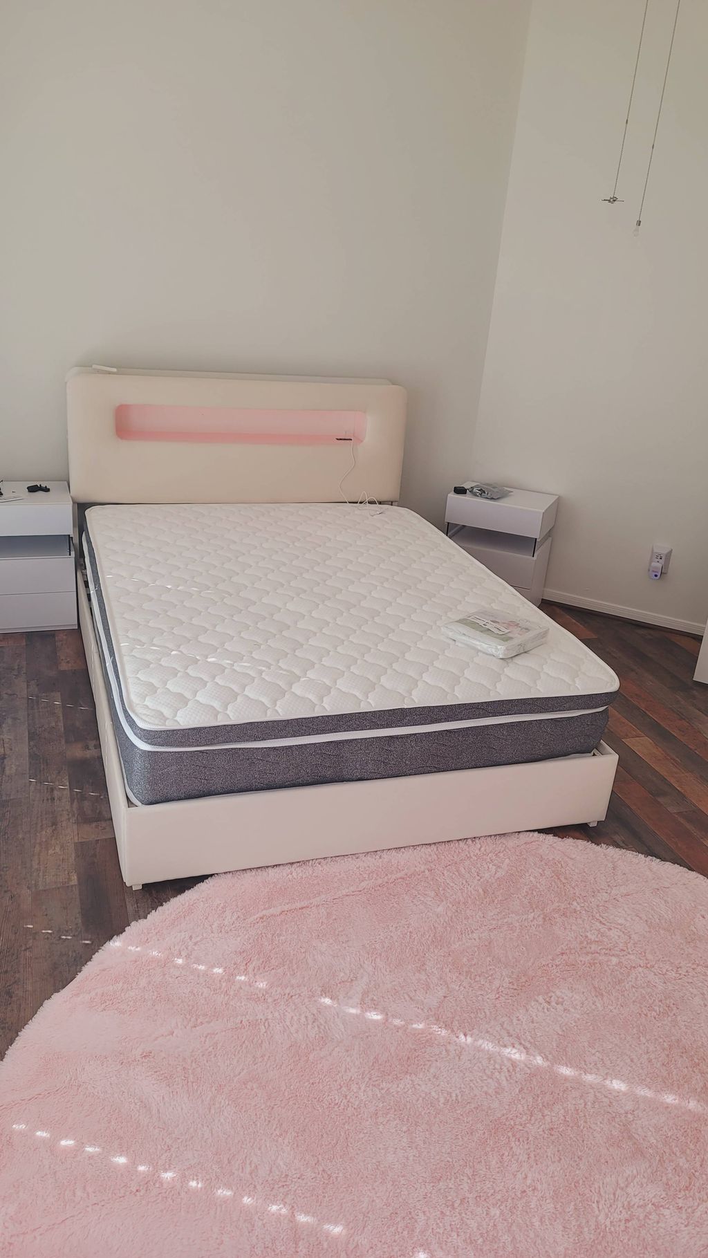 Assembly of Bed and Nightstands