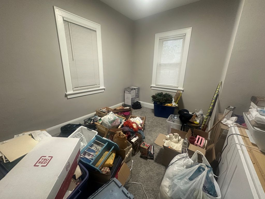 Cluttered room before