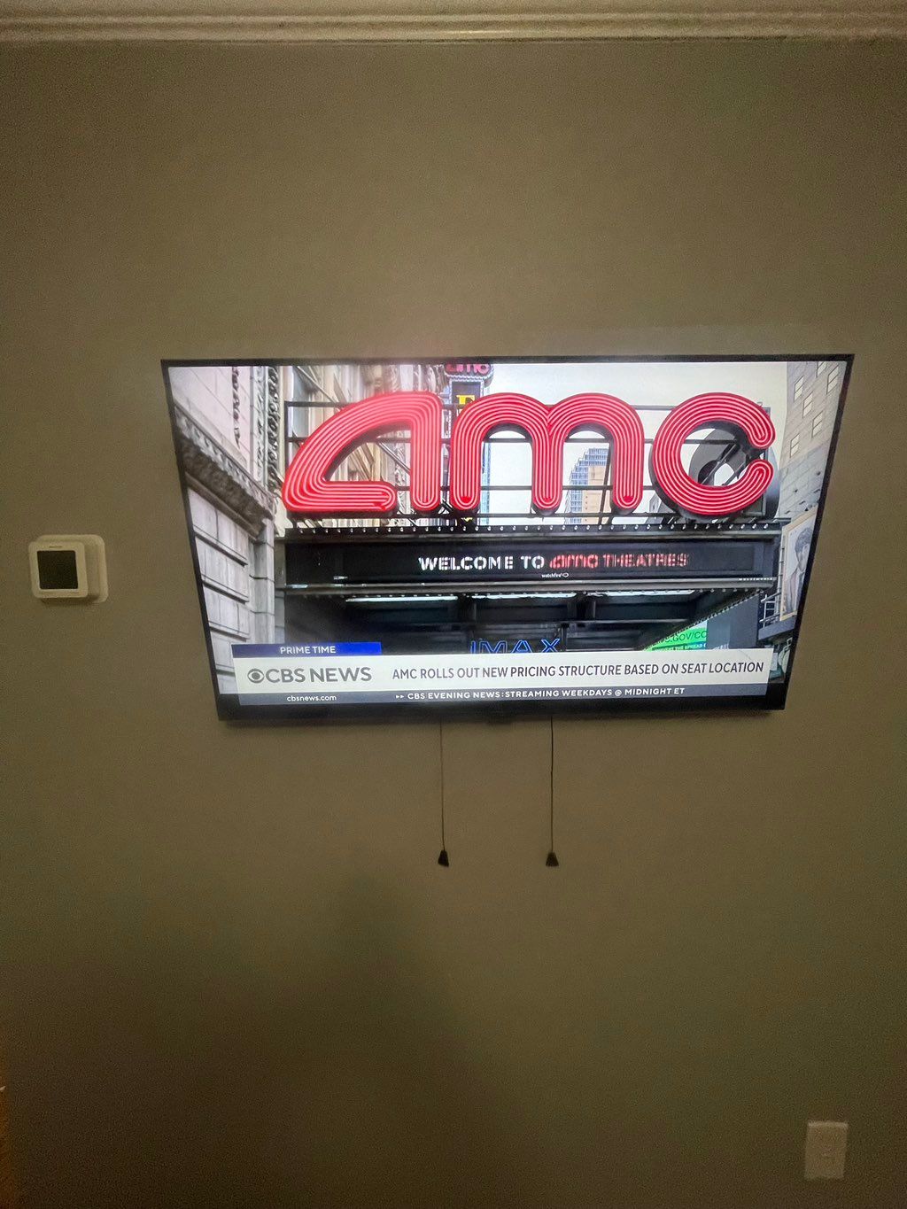 Ran additional outlet diagonally to center tv on w