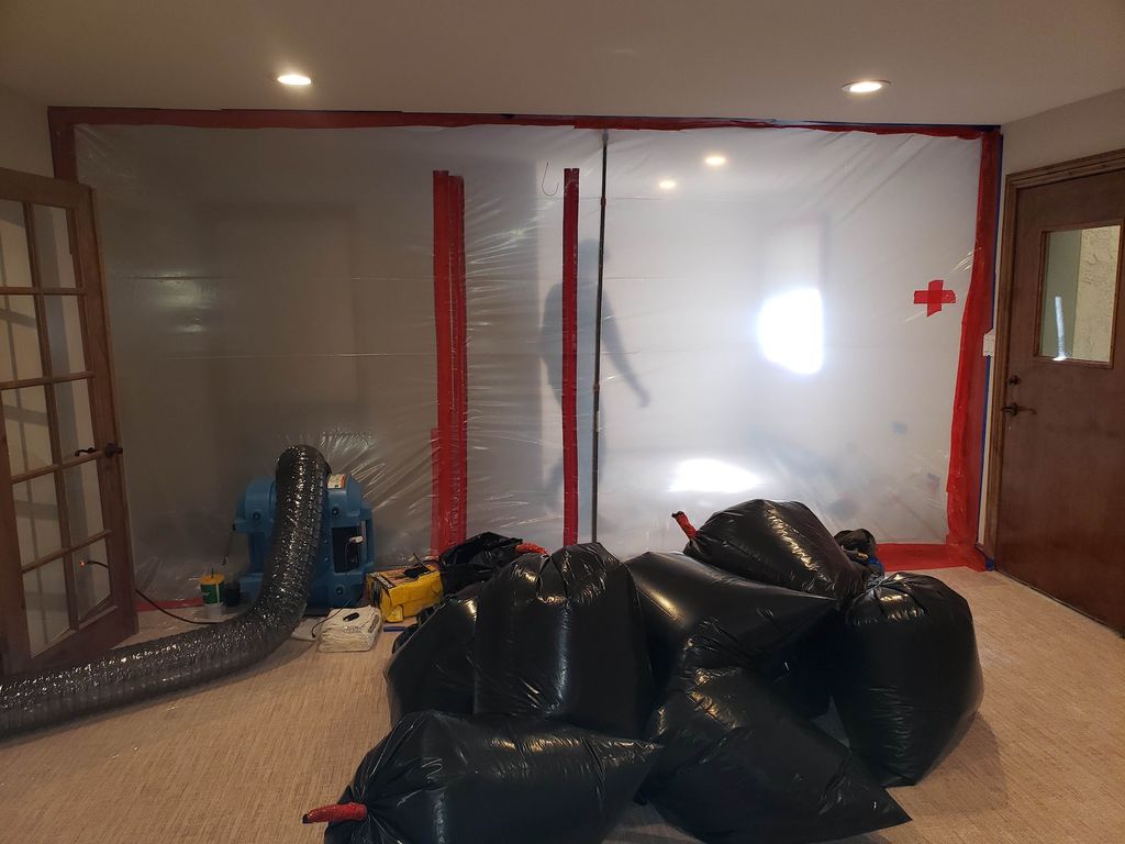 Contained work space with double-bagged debris