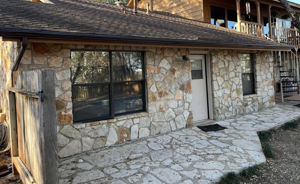 After: Complete with downspout to direct water awa
