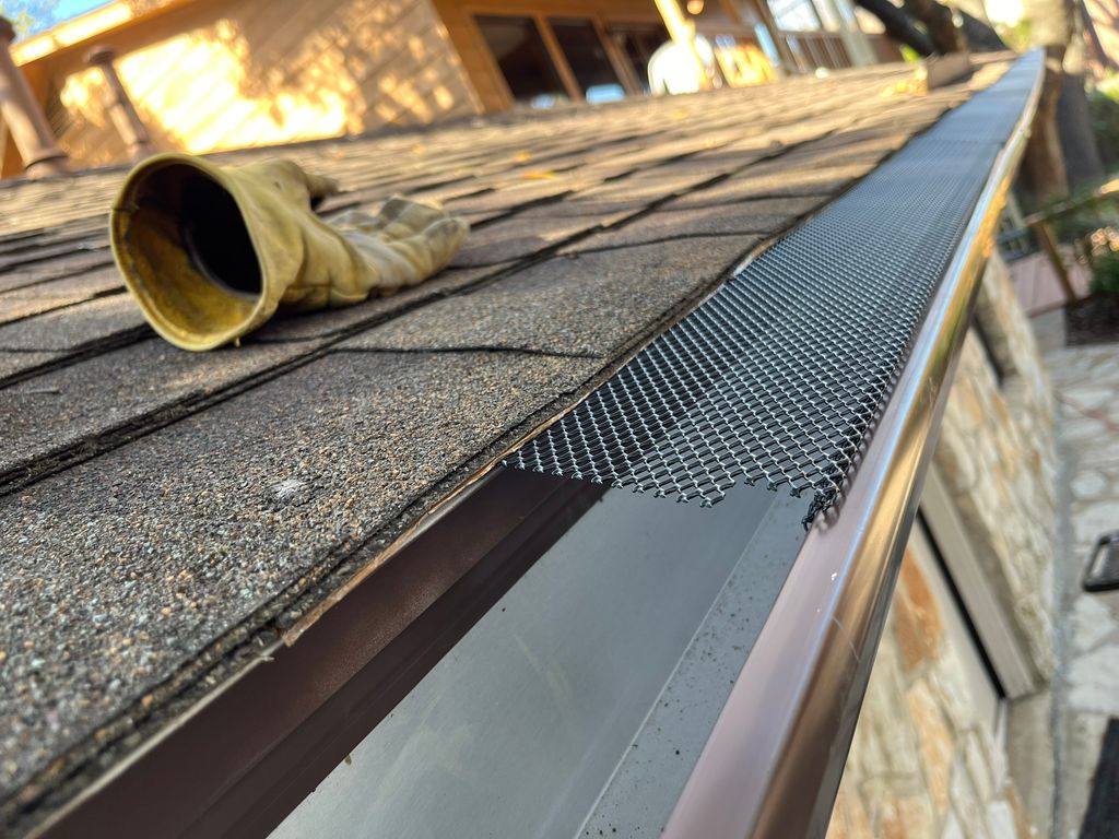 During: New gutters with gutter guards will preser