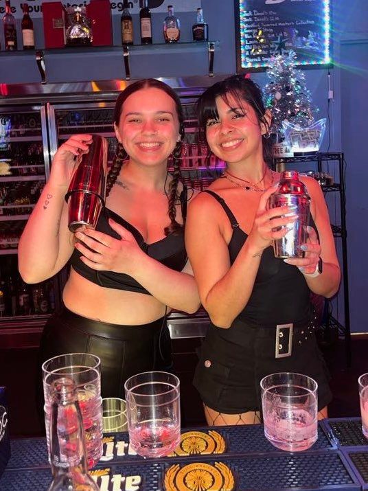 My fellow bartender and I mixing drinks at a night