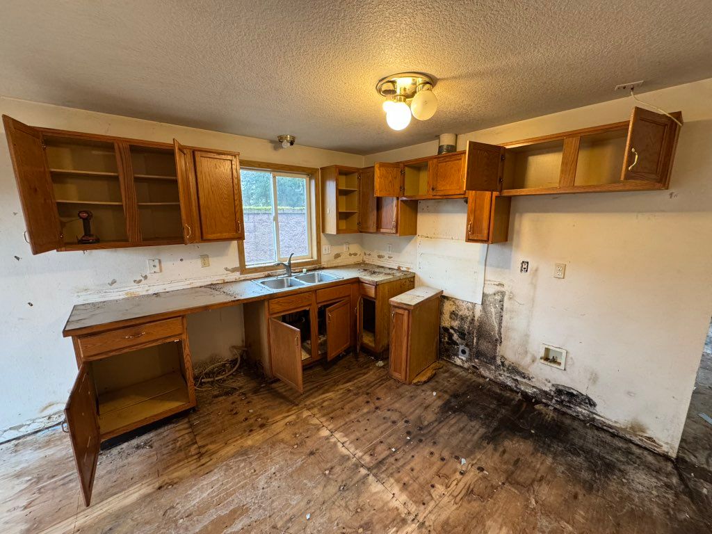 BEFORE- This kitchen was in rough shape!