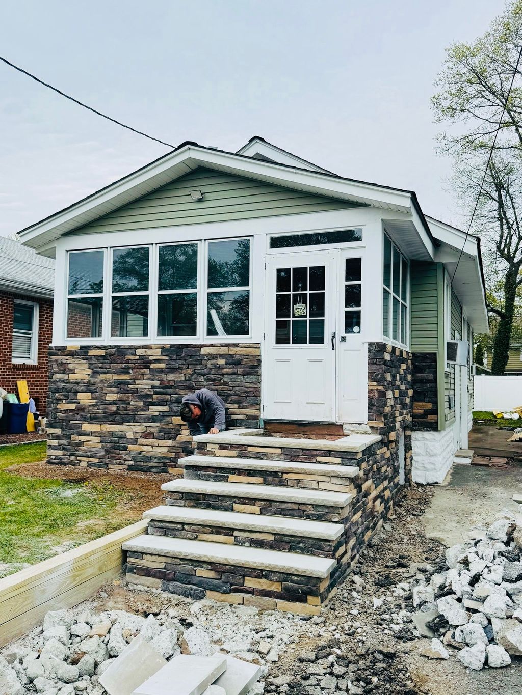 Exterior remodel will siding, front and backyard