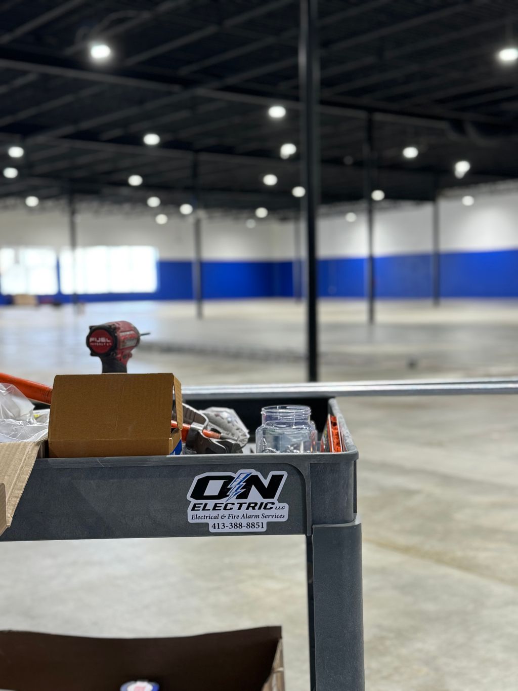 Wiring up the new pickleball court in western mass