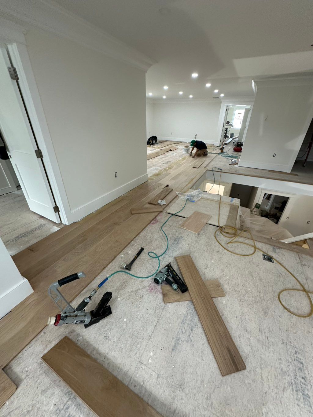 7in wide white oak solid hardwood glued down and n