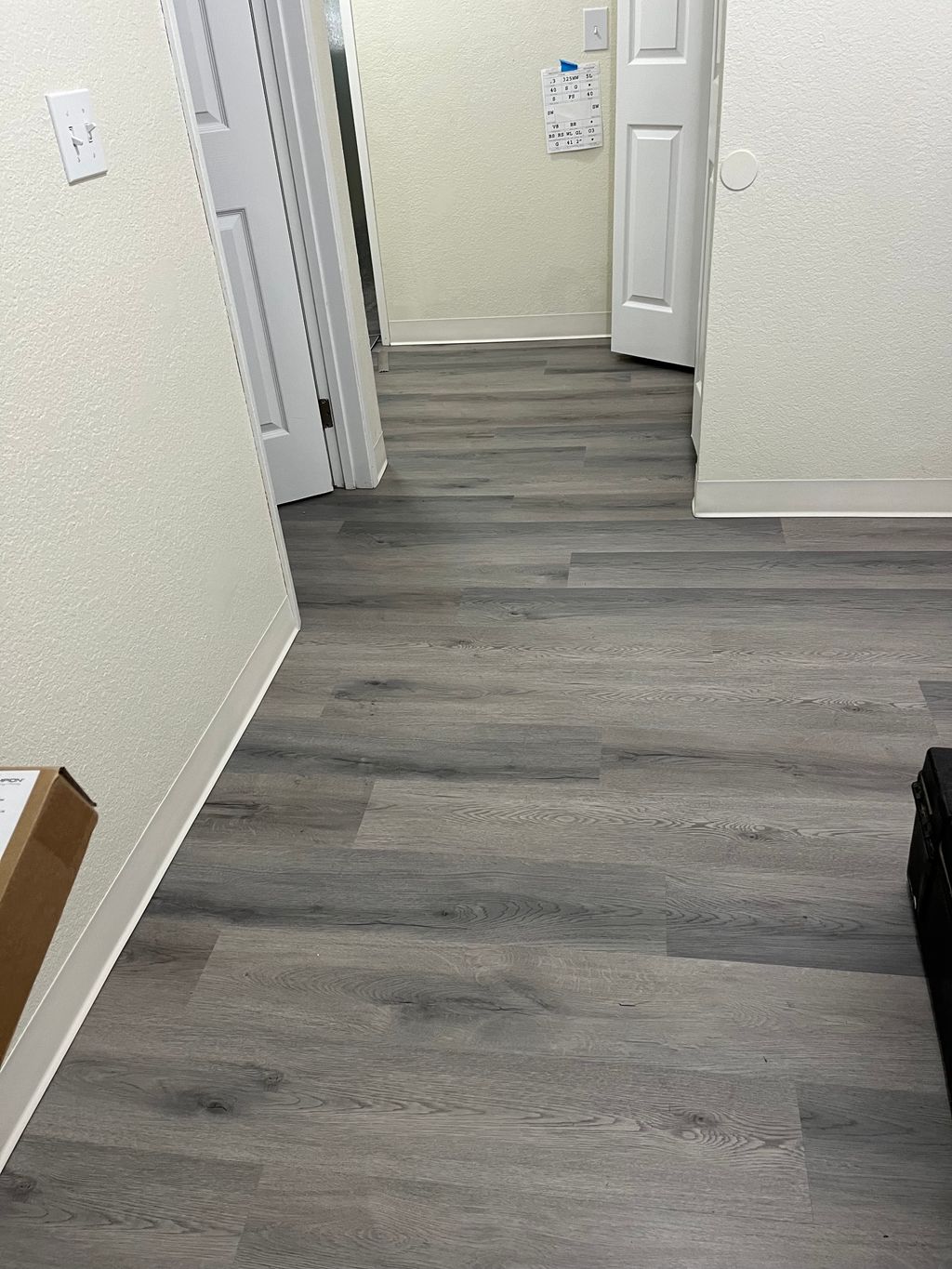 We installed sheet vinyl throughout apartment unit
