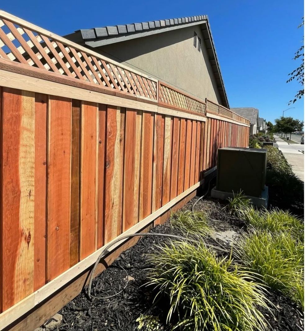 New Fence installation with privacy lattice 