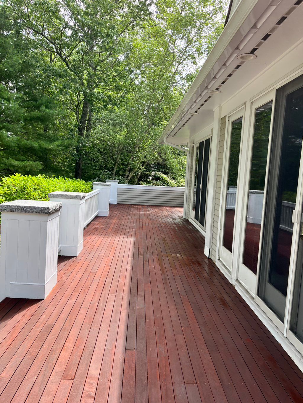 The after , power-washed  & new staining done 