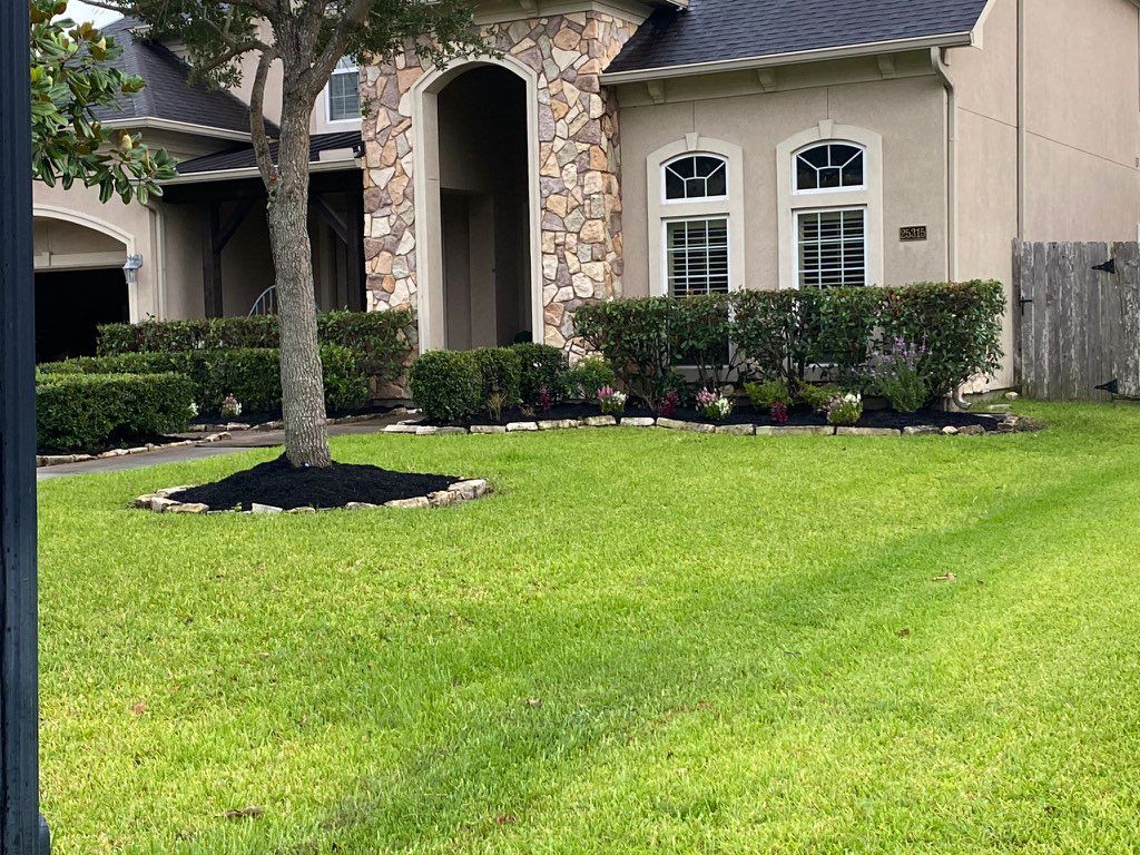 Mulch & flowerInstallation on flower beds. 