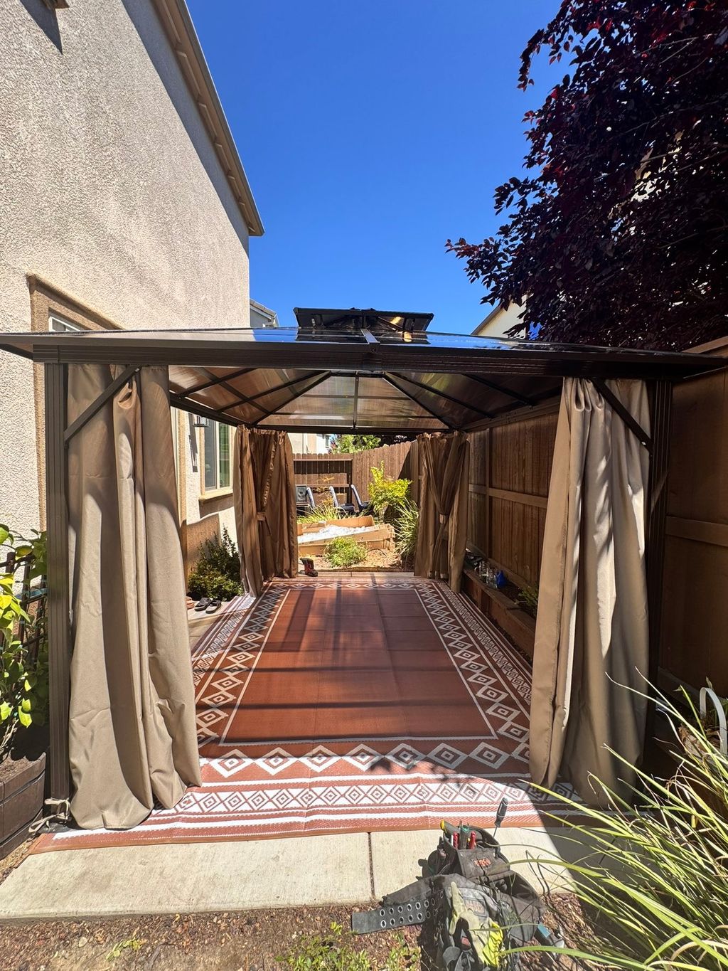 Installing a gazebo for a patio.