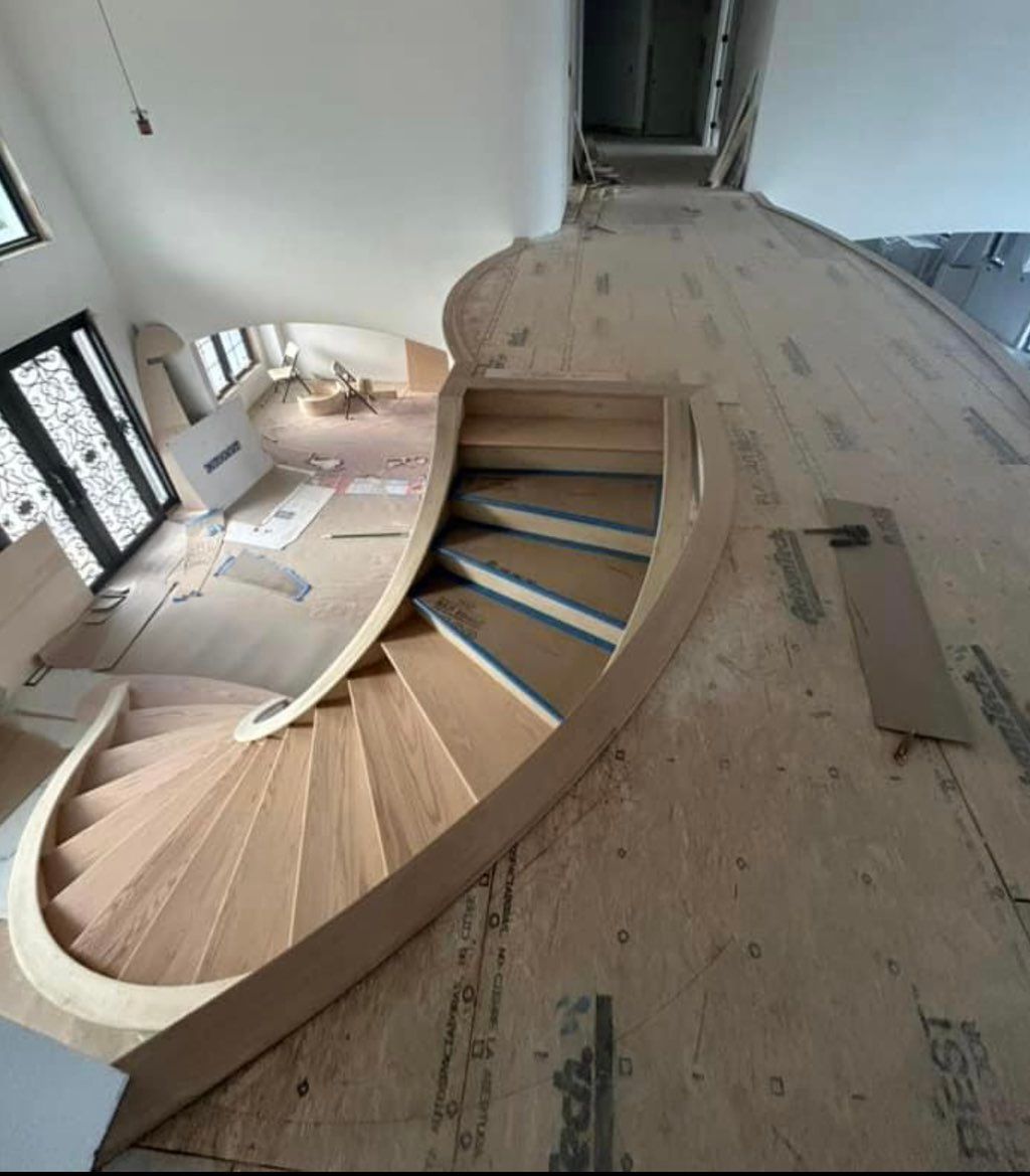Custom staircase, typical pricing $70k+