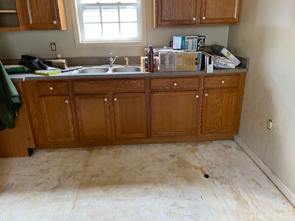 Before picture of kitchen where I painted the cabi