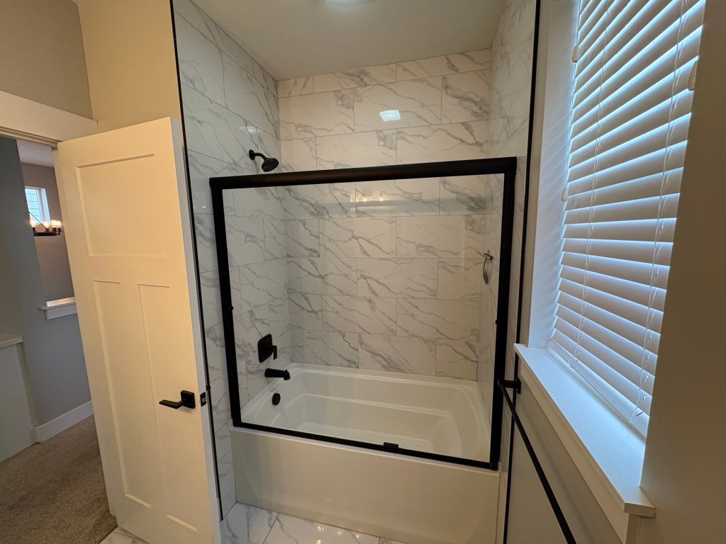 Shower door installation.