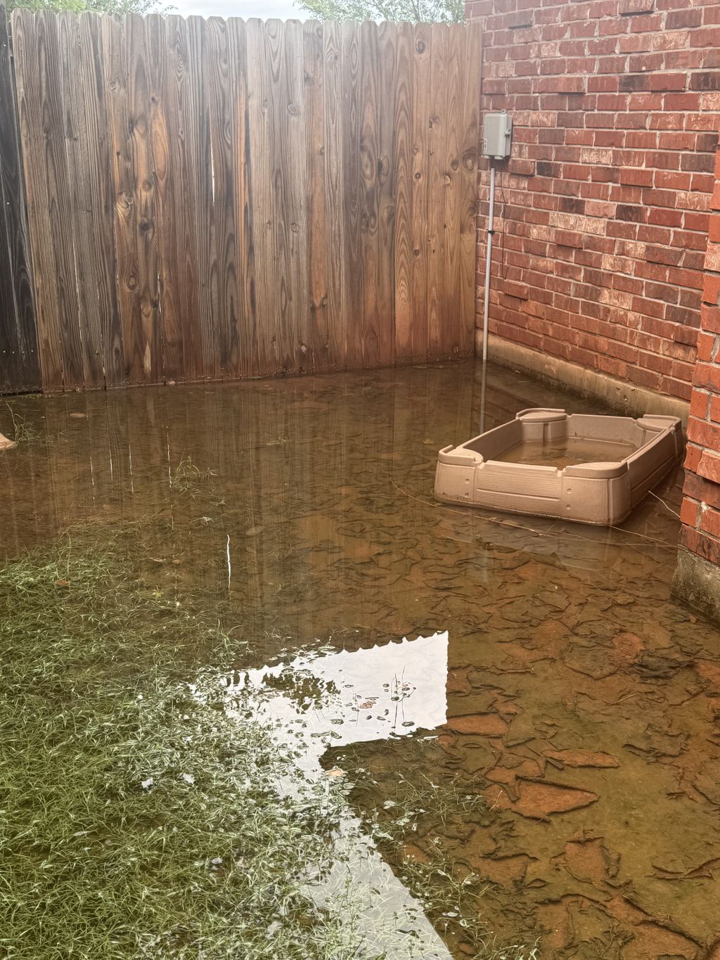 Before - too low of a grade not allowing water to 