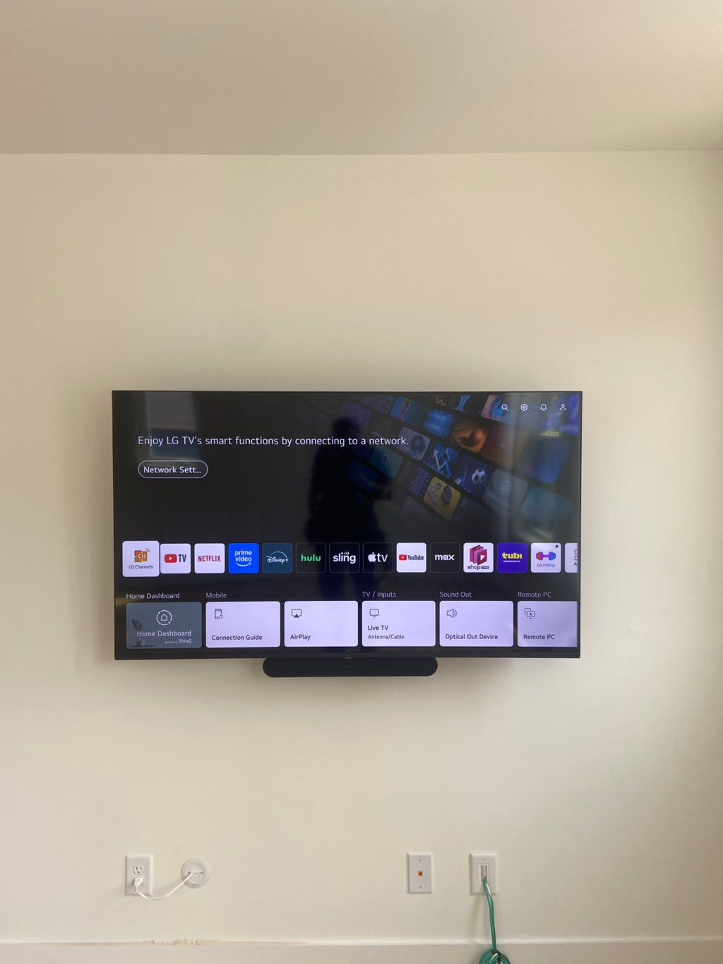 65in w/ soundbar and wire concealment 