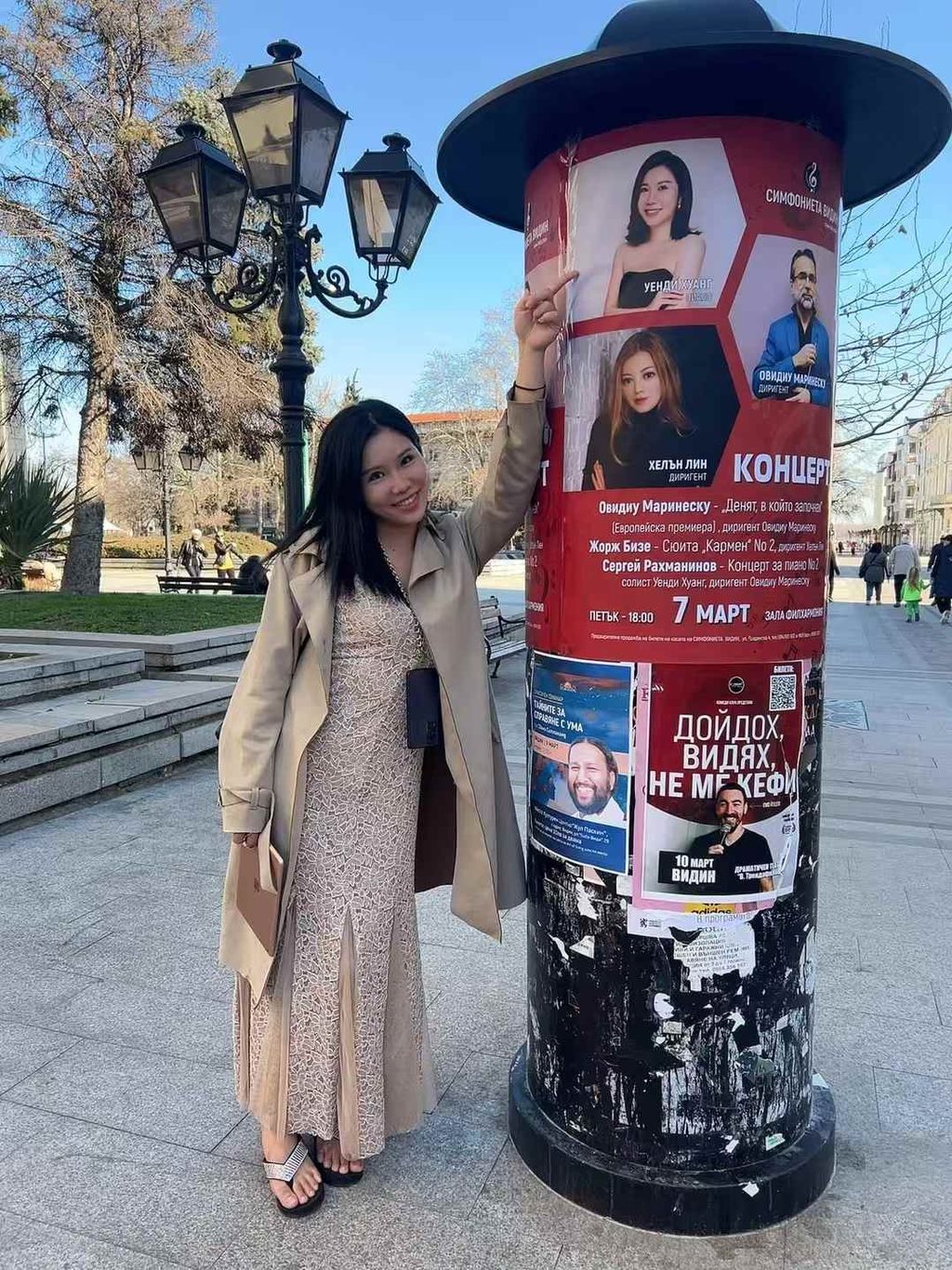 Dr. Huang in Bulgaria with with her concert poster