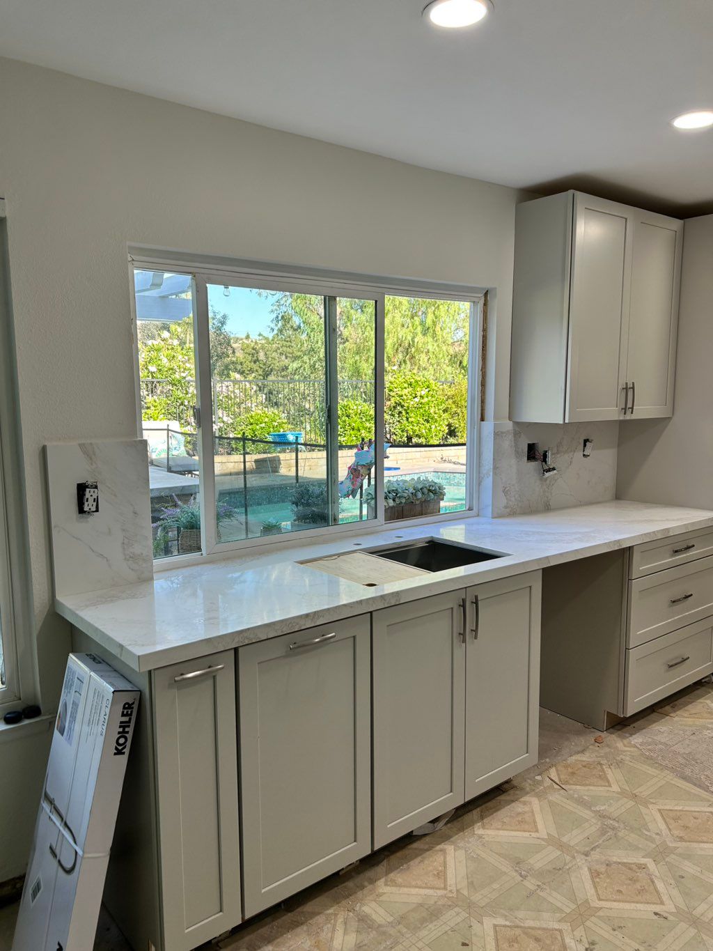 Custom FullBacksplash with Book match Countertops 