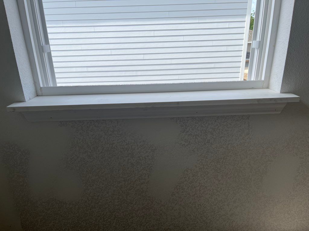 Window sill installed on new construction with cas