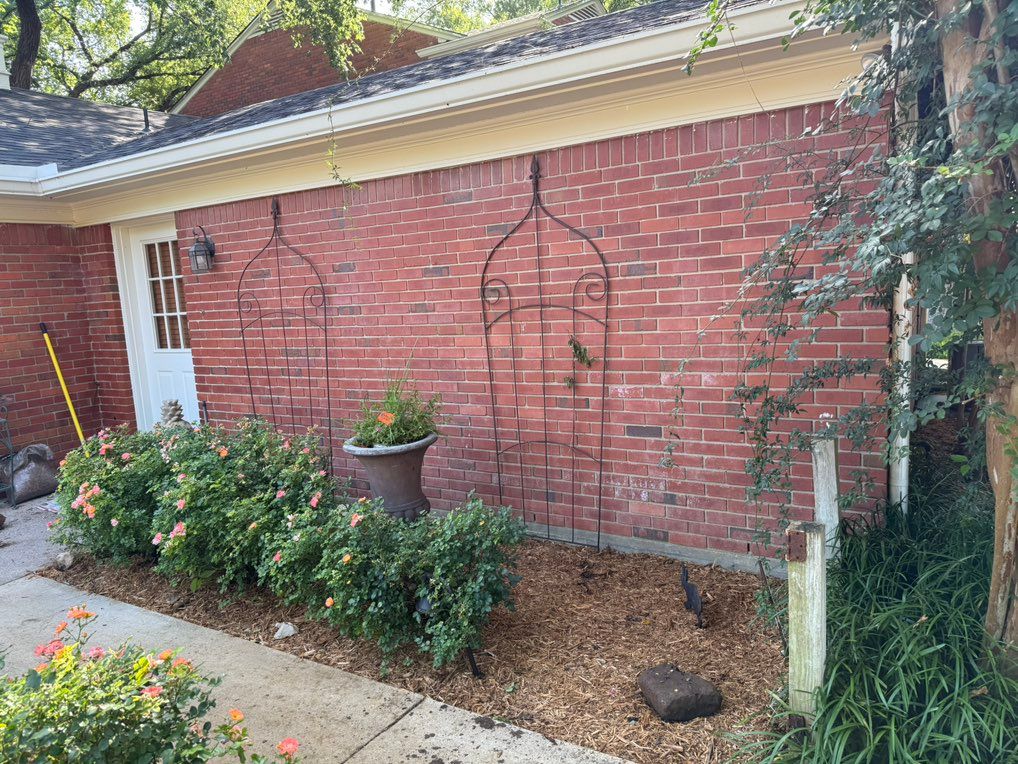 The after of this flowerbed. Rid of weeds, heavy n
