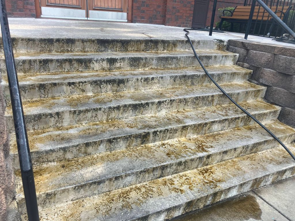 Before Pressure washing stairs at Miller's Ale hou