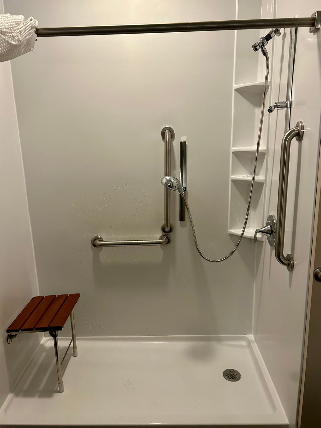 New walk-in shower with grab bars