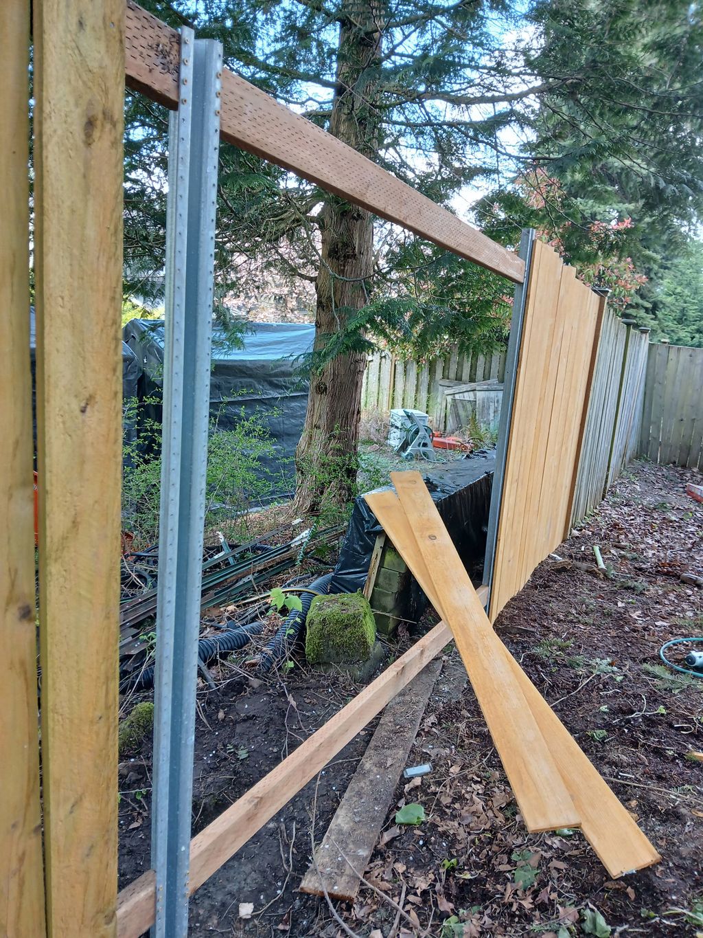 new fence cedar with steel post .more longer  life
