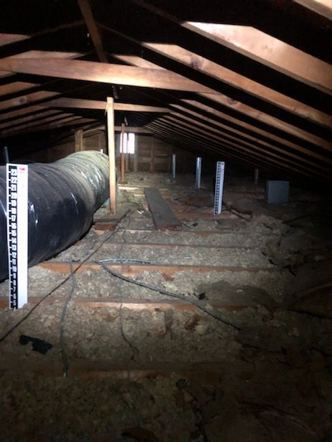 Before Photo of a customer's attic. (A)