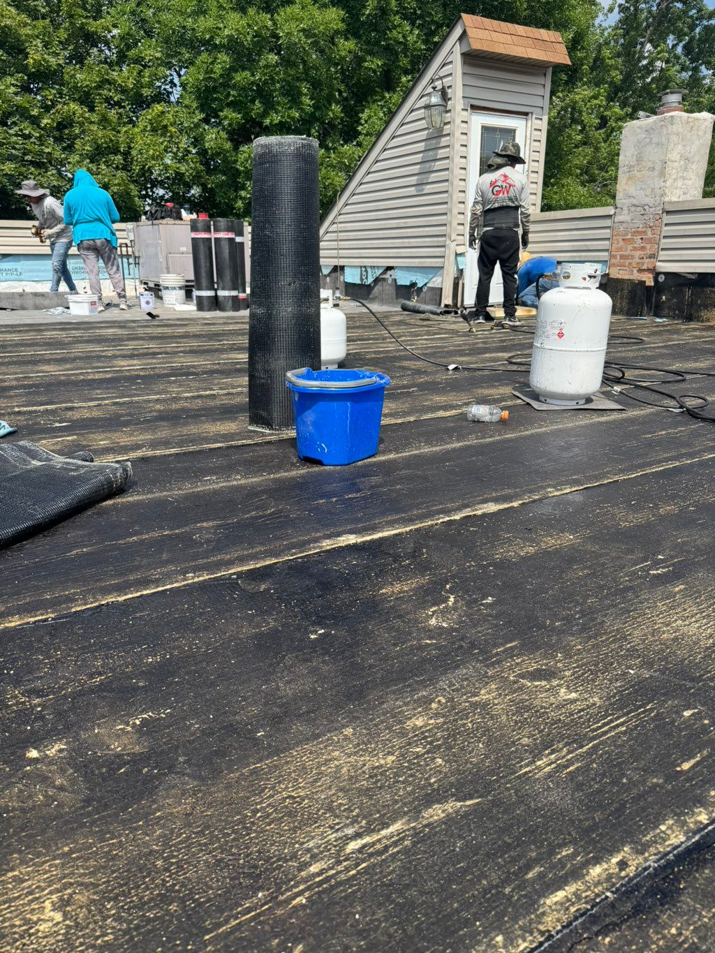 Gutter Wilson Team
Burning a new flat roofing,