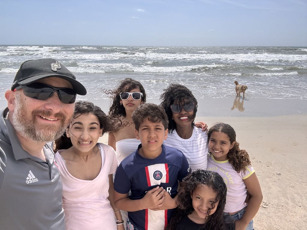 We are the Sheen Family! John is from England and 