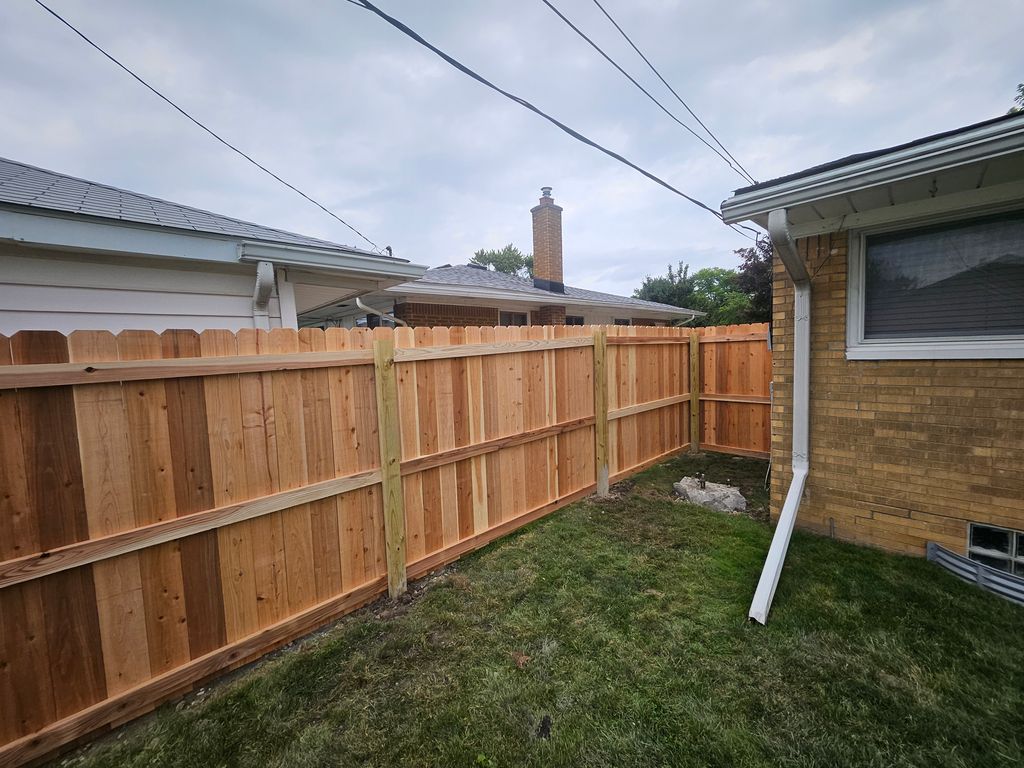 24 feet of cedar and 24 feet of chain link all don