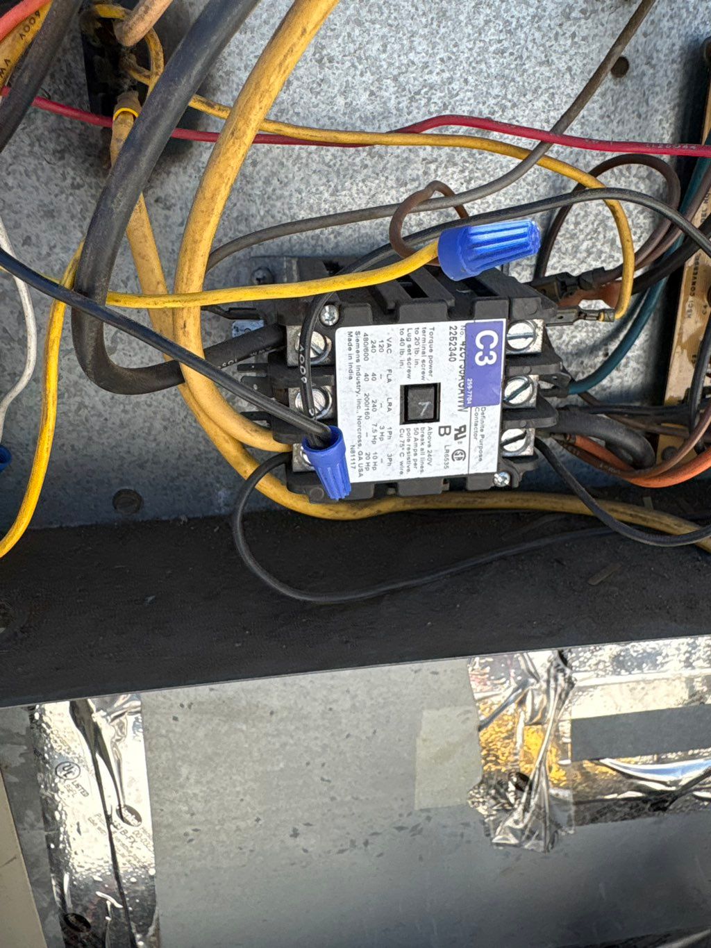 Contractor  installed with  a wrong  coil rating.