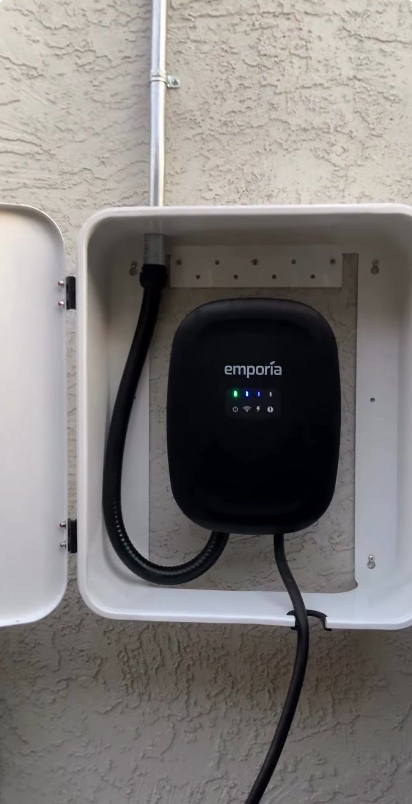 Ev charger hardwired with lockable weatherproof bo
